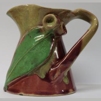 Image title Vintage Rare Australian Pottery Jug With Green, Red, & Beige Gum-leaf and Nut Design By Remued 1
